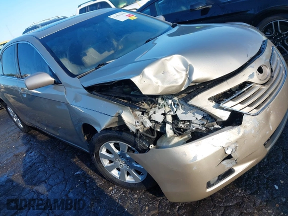 2007 Toyota Camry LE with VIN 4T1BK46K27U010739, listed as a IAAI auction lot 41983608 with 193,763 mi miles and . Bid and sale history available at DreamBid. Image 1.