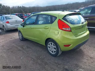2011 Ford Fiesta SE with VIN 3FADP4EJ2BM113623, listed as a IAAI auction lot 41685229 with 137,954 mi miles. Bid and sale history available at carsss.com. Image 3.