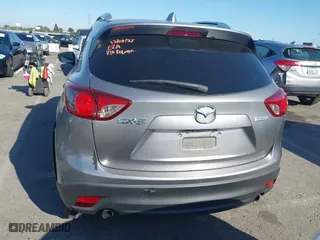 2013 Mazda CX-5 Touring with VIN JM3KE2CE3D0123138, listed as a IAAI auction lot 41818678 with 173,909 mi miles. Bid and sale history available at carsss.com. Image 16.