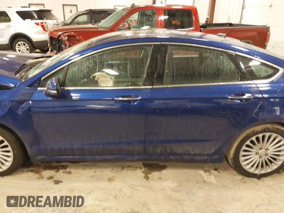2013 Ford Fusion Titanium Hybrid with VIN 3FA6P0RU9DR320909, listed as a IAAI auction lot 41477530 with 108,153 mi miles. Bid and sale history available at carsss.com. Image 14.