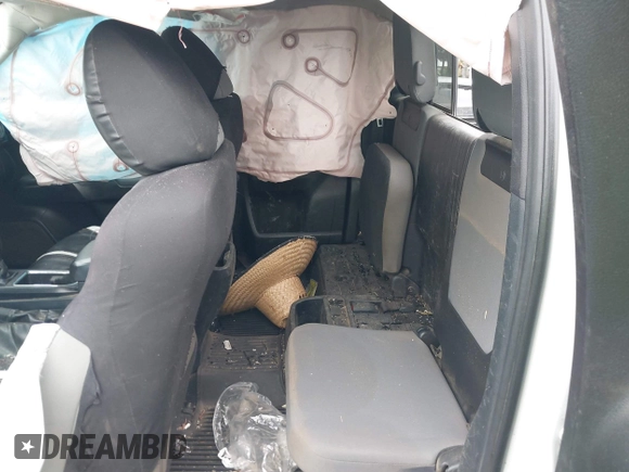 2019 Toyota Tacoma SR with VIN 5TFRX5GN9KX140351, listed as a IAAI auction lot 42593591 with 202,707 mi miles and . Bid and sale history available at DreamBid. Image 8.