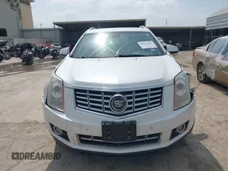 2013 Cadillac SRX Performance Collection z VIN 3GYFNDE30DS648288, wystawiony jako IAAI lot #41955462 z przebiegiem 135 956 mil mil oraz . Historia ofert i sprzedaży dostępna na DreamBid. Obrazek 12.