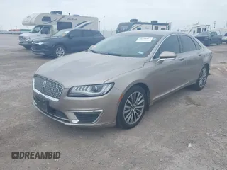 2018 Lincoln MKZ Hybrid Premiere with VIN 3LN6L5KU0JR629348, listed as a IAAI auction lot 41921017 with 119,974 mi miles and . Bid and sale history available at DreamBid. Image 2.