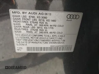 2014 Audi Q7 Premium Plus with VIN WA1LGAFE9ED001319, listed as a IAAI auction lot 41775171 with 144,711 mi miles and . Bid and sale history available at DreamBid. Image 9.