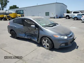 2012 Honda Insight z VIN JHMZE2H30CS003488, wystawiony jako Copart lot #59016385 z przebiegiem Nie podano mil oraz Szkoda całkowita • Salvage title. Historia ofert i sprzedaży dostępna na DreamBid. Obrazek 4.