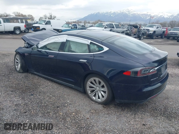 2015 Tesla Model S 85D with VIN 5YJSA1H23FFP79020, listed as a IAAI auction lot 41819392 with Not Provided miles. Bid and sale history available at carsss.com. Image 3.