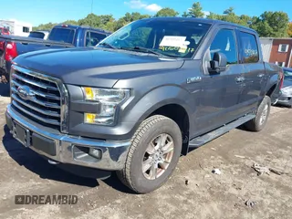 2015 Ford F-150 XLT with VIN 1FTEW1EF7FFB65198, listed as a IAAI auction lot 40509417 with 119,649 mi miles and . Bid and sale history available at DreamBid. Image 2.