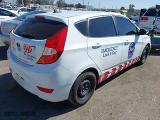 2012 Hyundai Accent GS with VIN KMHCT5AEXCU051493, listed as a IAAI auction lot 41666634 with 176,293 mi miles. Bid and sale history available at carsss.com. Image 4.