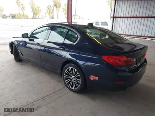 2019 BMW 5 Series 530e iPerformance with VIN WBAJA9C50KB254535, listed as a IAAI auction lot 41094049 with 57,874 mi miles. Bid and sale history available at carsss.com. Image 3.