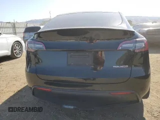 2022 Tesla Model Y Performance with VIN 7SAYGDEF1NF486218, listed as a Copart auction lot 63127435 with 99,302 mi miles and Salvage title. Bid and sale history available at DreamBid. Image 6.