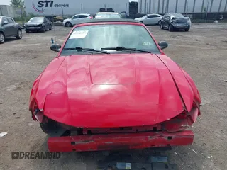 2003 Ford Mustang Deluxe z VIN 1FAFP44433F452977, wystawiony jako IAAI lot #42598309 z przebiegiem 99 596 mil mil oraz . Historia ofert i sprzedaży dostępna na DreamBid. Obrazek 12.