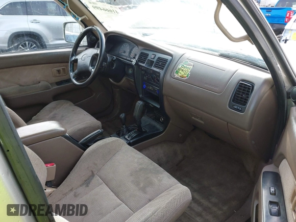 1999 Toyota 4Runner SR5 z VIN JT3HN86R0X0196528, wystawiony jako IAAI lot #41666499 z przebiegiem 294 216 mil mil oraz . Historia ofert i sprzedaży dostępna na DreamBid. Obrazek 5.