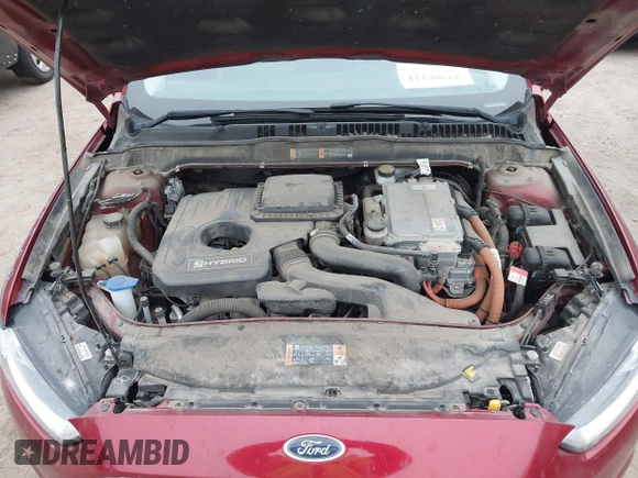 2016 Ford Fusion Titanium Hybrid with VIN 3FA6P0RU3GR355398, listed as a IAAI auction lot 41140669 with 125,959 mi miles. Bid and sale history available at carsss.com. Image 10.