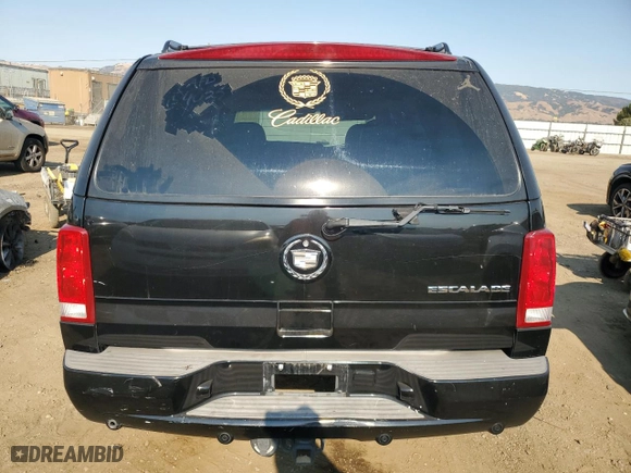 2003 Cadillac Escalade with VIN 1GYEC63T63R279728, listed as a Copart auction lot 73736554 with 128,564 mi miles and Salvage Title. Bid and sale history available at carsss.com. Image 6.