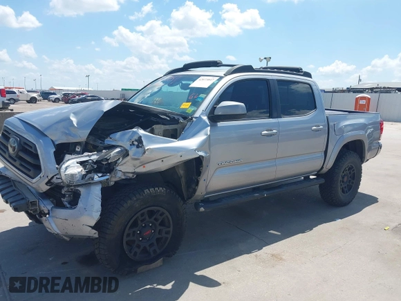 2018 Toyota Tacoma SR with VIN 3TMCZ5AN2JM172829, listed as a IAAI auction lot 42073847 with 136,671 mi miles and . Bid and sale history available at carsss.com. Image 6.