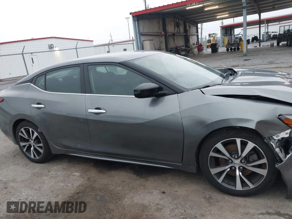 2016 Nissan Maxima SV with VIN 1N4AA6AP7GC449545, listed as a IAAI auction lot 41850689 with 97,859 mi miles and . Bid and sale history available at DreamBid. Image 13.