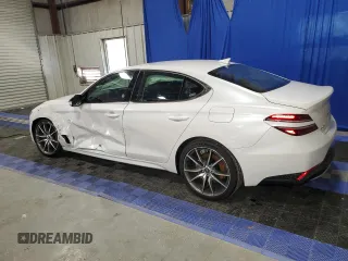 2023 Genesis G70 2.0T with VIN KMTG34TAXPU131832, listed as a Copart auction lot 44111124 with 3,203 mi miles and Non Repairable. Bid and sale history available at DreamBid. Image 2.