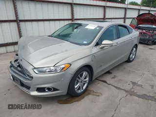 2015 Ford Fusion Energi Titanium with VIN 3FA6P0SU3FR114739, listed as a IAAI auction lot 42003011 with 120,553 mi miles. Bid and sale history available at carsss.com. Image 18.