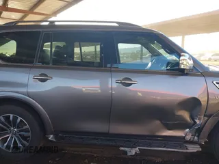 2019 Nissan Armada SL z VIN JN8AY2NDXKX008142, wystawiony jako IAAI lot #41765577 z przebiegiem 113 247 mil mil oraz . Historia ofert i sprzedaży dostępna na DreamBid. Obrazek 13.