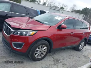 2018 Kia Sorento LX z VIN 5XYPG4A39JG400774, wystawiony jako IAAI lot #41711055 z przebiegiem 56 046 mil mil oraz . Historia ofert i sprzedaży dostępna na DreamBid. Obrazek 14.