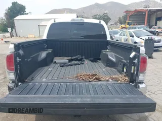 2023 Toyota Tacoma SR with VIN 3TMCZ5AN1PM556299, listed as a IAAI auction lot 42344160 with 42,338 mi miles and . Bid and sale history available at DreamBid. Image 17.