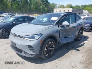 2022 Volkswagen ID.4 Pro S z VIN WVGGNPE24NP059968, wystawiony jako IAAI lot #42210089 z przebiegiem 36 860 mil mil oraz . Historia ofert i sprzedaży dostępna na DreamBid. Obrazek 2.