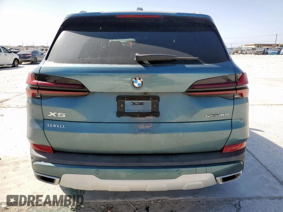 2025 BMW X5 sDrive40i with VIN 5UX13EU04S9Y41593, listed as a Copart auction lot 49856115 with 395 mi miles and Salvage Title. Bid and sale history available at carsss.com. Image 6.
