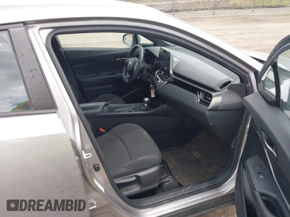 2019 Toyota C-HR XLE with VIN NMTKHMBX7KR079751, listed as a IAAI auction lot 42013399 with 74,665 mi miles. Bid and sale history available at carsss.com. Image 5.