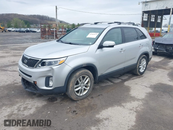 2014 Kia Sorento LX with VIN 5XYKTCA63EG506489, listed as a IAAI auction lot 41965074 with 143,875 mi miles and . Bid and sale history available at carsss.com. Image 2.