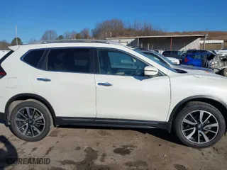 2019 Nissan Rogue SV with VIN 5N1AT2MV7KC819422, listed as a IAAI auction lot 41691724 with 104,551 mi miles. Bid and sale history available at carsss.com. Image 14.