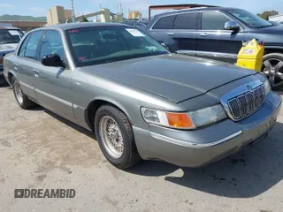2001 Mercury Grand Marquis LS with VIN 2MEFM75W51X633616, listed as a IAAI auction lot 42051119 with 123,236 mi miles and . Bid and sale history available at DreamBid. Image 1.