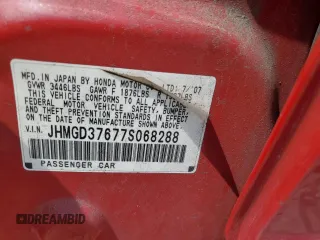 2007 Honda Fit Sport z VIN JHMGD37677S068288, wystawiony jako Copart lot #55105865 z przebiegiem Nie podano mil oraz Czysty tytuł • Clean title. Historia ofert i sprzedaży dostępna na DreamBid. Obrazek 12.