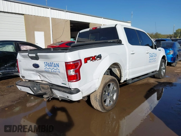2018 Ford F-150 XL with VIN 1FTEW1EG1JKE29623, listed as a IAAI auction lot 40615703 with 122,846 mi miles and . Bid and sale history available at DreamBid. Image 4.