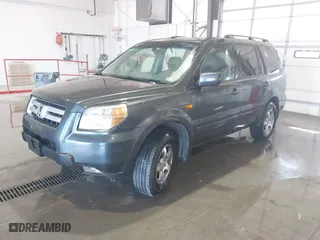 2006 Honda Pilot EX-L with RES with VIN 5FNYF28666B015764, listed as a IAAI auction lot 41703704 with 211,289 mi miles. Bid and sale history available at carsss.com. Image 2.