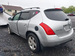 2003 Nissan Murano SE z VIN JN8AZ08W83W231298, wystawiony jako IAAI lot #42239796 z przebiegiem Nie podano mil oraz . Historia ofert i sprzedaży dostępna na DreamBid. Obrazek 3.