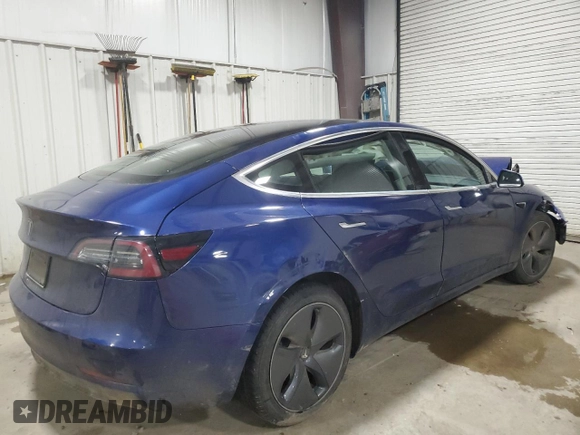 2020 Tesla Model 3 Standard Range Plus with VIN 5YJ3E1EA3LF803784, listed as a Copart auction lot 52881375 with 88,912 mi miles and Salvage Title. Bid and sale history available at DreamBid. Image 3.