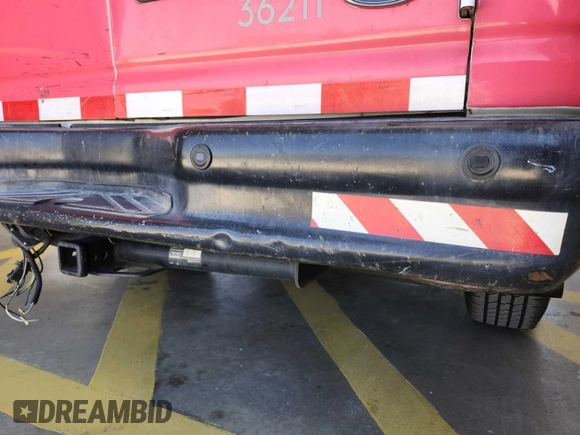 2009 Ford Econoline Cargo z VIN 1FTNE24L39DA13631, wystawiony jako IAAI lot #42563186 z przebiegiem 140 603 mil mil oraz . Historia ofert i sprzedaży dostępna na DreamBid. Obrazek 38.