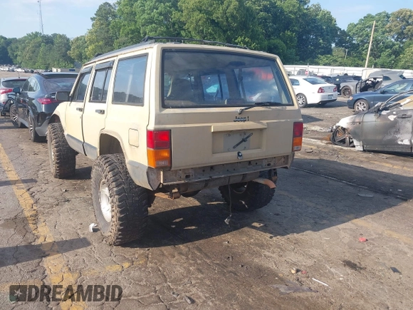 1995 Jeep Cherokee Sport with VIN 1J4FJ68S3SL555908, listed as a IAAI auction lot 42222016 with 283,444 mi miles and . Bid and sale history available at DreamBid. Image 3.