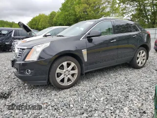 2014 Cadillac SRX Performance Collection z VIN 3GYFNFE33ES687941, wystawiony jako Copart lot #57726675 z przebiegiem 164 059 mil mil oraz Czysty tytuł • Clean title. Historia ofert i sprzedaży dostępna na DreamBid. Obrazek 1.