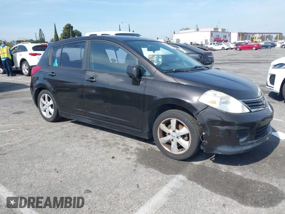 2012 Nissan Versa S with VIN 3N1BC1CP4CK203309, listed as a IAAI auction lot 41614884 with 141,770 mi miles. Bid and sale history available at carsss.com. Image 1.