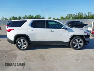 2021 Chevrolet Traverse LT z VIN 1GNERHKWXMJ163645, wystawiony jako IAAI lot #41949887 z przebiegiem 89 448 mil mil oraz . Historia ofert i sprzedaży dostępna na DreamBid. Obrazek 13.