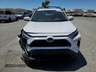 2022 Toyota RAV4 XLE with VIN 2T3W1RFV8NW233397, listed as a Copart auction lot 65276715 with 20,956 mi miles and Salvage title. Bid and sale history available at DreamBid. Image 5.