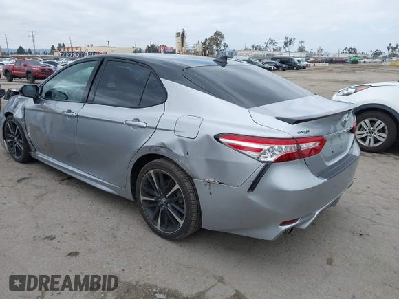 2020 Toyota Camry XSE with VIN 4T1K61AK1LU318098, listed as a IAAI auction lot 42197271 with 64,118 mi miles and . Bid and sale history available at DreamBid. Image 3.