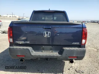 2021 Honda Ridgeline RTL-E with VIN 5FPYK3F75MB001663, listed as a Copart auction lot 61952705 with 52,093 mi miles and Salvage title. Bid and sale history available at DreamBid. Image 6.