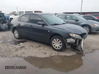 2009 Mazda 3 i Touring Value with VIN JM1BK32F291235335, listed as a IAAI auction lot 41880603 with 144,358 mi miles. Bid and sale history available at carsss.com. Image 1.