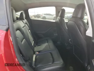 2021 Tesla Model Y Long Range with VIN 5YJYGDEEXMF217816, listed as a Copart auction lot 51008665 with 57,392 mi miles and Salvage Title. Bid and sale history available at DreamBid. Image 11.