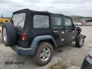 2015 Jeep Wrangler Unlimited Willys Wheeler with VIN 1C4BJWDG3FL601197, listed as a Copart auction lot 53832465 with 216,141 mi miles and Salvage Title. Bid and sale history available at DreamBid. Image 3.