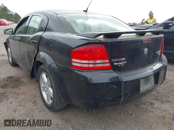 2010 Dodge Avenger R/T with VIN 1B3CC5FB1AN200983, listed as a IAAI auction lot 41959344 with 121,934 mi miles and . Bid and sale history available at DreamBid. Image 3.