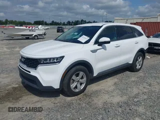 2021 Kia Sorento LX z VIN 5XYRG4LC6MG022343, wystawiony jako IAAI lot #42139411 z przebiegiem 67 266 mil mil oraz . Historia ofert i sprzedaży dostępna na DreamBid. Obrazek 2.