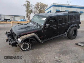 2020 Jeep Gladiator Rubicon z VIN 1C6JJTBG6LL117900, wystawiony jako Copart lot #50077545 z przebiegiem 74 368 mil mil oraz Szkoda całkowita • Salvage title. Historia ofert i sprzedaży dostępna na DreamBid. Obrazek 1.